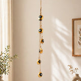 Evil Eye Gold Bell Jute Wall Hanging