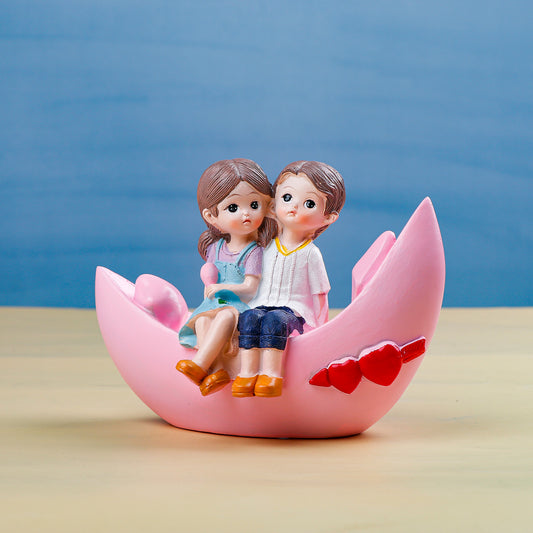 Blooming love in Boat Couple Showpiece