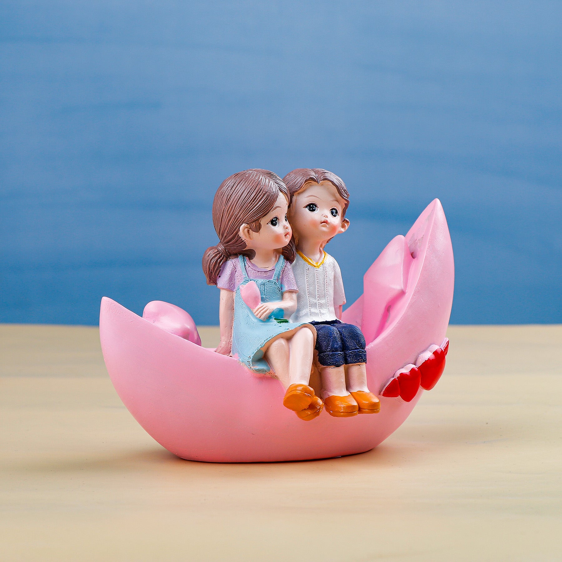 Blooming love in Boat Couple Showpiece