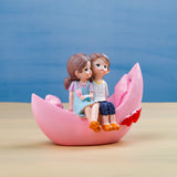 Blooming love in Boat Couple Showpiece