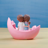Blooming love in Boat Couple Showpiece