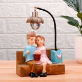 Couch Couple Illuminating Showpiece