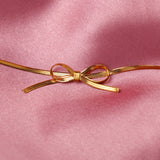Knotted Ribbon Golden Bracelet