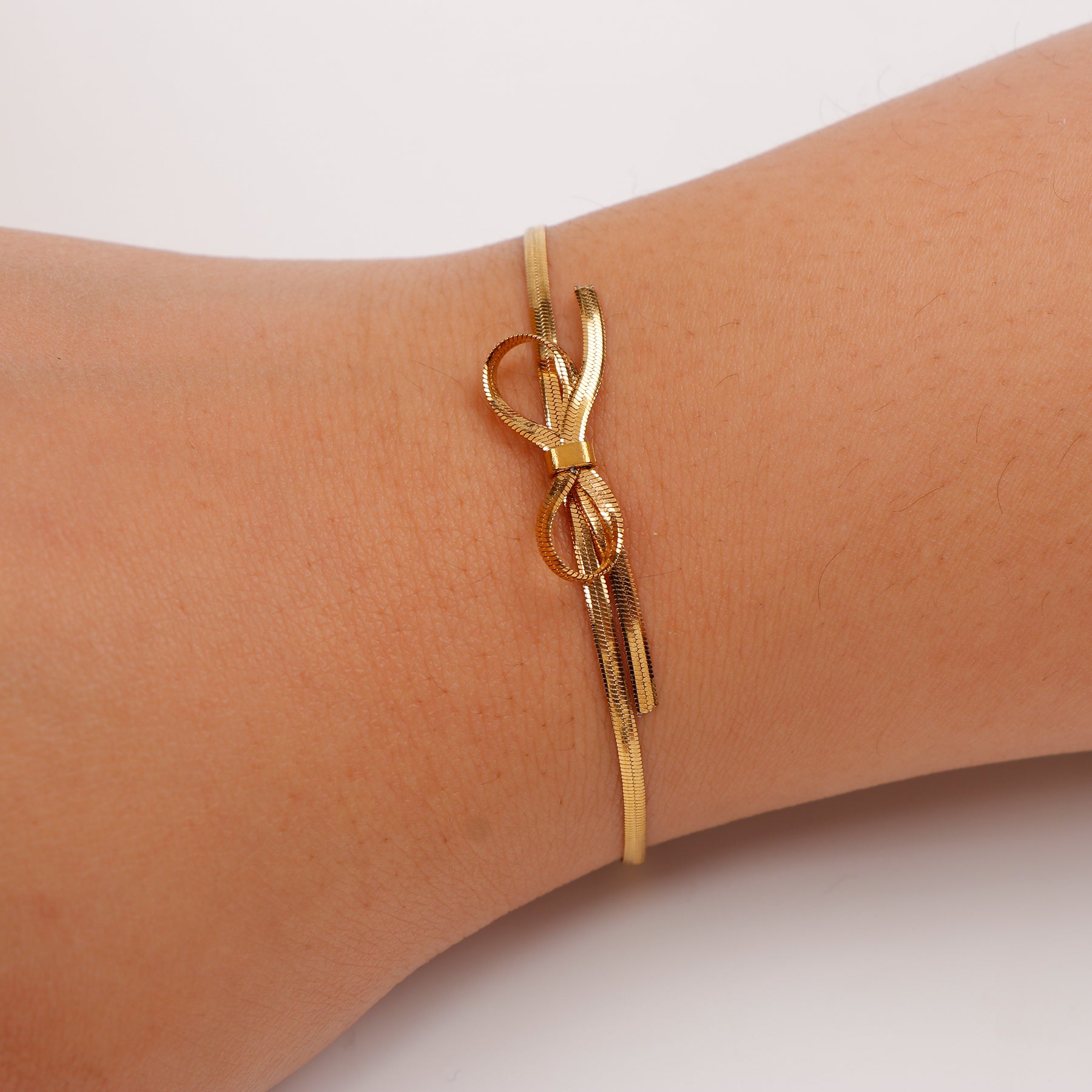 Knotted Ribbon Golden Bracelet