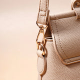 Beige Oval-Clasp Handbag