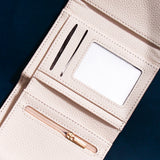 White Pebbled Leather Trifold Snap Wallet