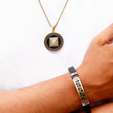 Gold-Tone Greek Key Medallion Necklace & Engraved Leather Bracelet Set