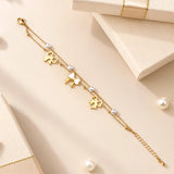 Bow and Pearl Charm Bracelet