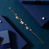 Bow and Pearl Charm Bracelet