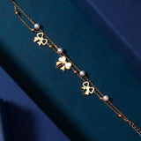 Bow and Pearl Charm Bracelet