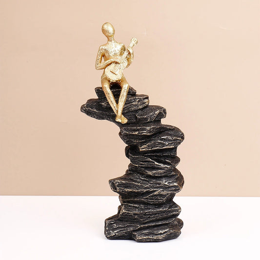 Golden Guitarist on Rocks Showpiece