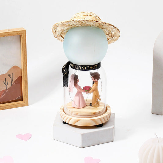 Archies Straw Hat Couple Glass Dome Showpiece