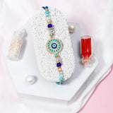 Evil Eye & Turquoise Cameo Tassel Rakhi