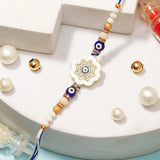 Ivory Flower Evil Eye Rakhi & UXR Royal Life Perfume Mug Set
