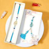 Golden Eye & Turquoise Drop Tassel Rakhi Set