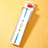 Golden Eye & Turquoise Drop Tassel Rakhi Set
