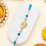 Golden Eye & Turquoise Drop Tassel Rakhi Set