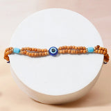 Wooden Evil Eye Beaded Rakhi & UXR Classic Oud Perfume Mug Set