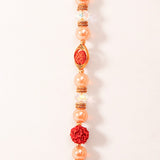 Rudraksha Pearl & Golden Charm Tassel Rakhi Set