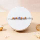 Rakhi for Brother with Perfume - Blue Stone Rakhi & UXR Classic Oud Gift Set