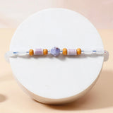 Blue Stone Beaded Rakhi & UXR Classic Oud Perfume Mug Set