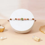 Rose Quartz Tiger Eye Beaded Rakhi & UXR Classic Oud Perfume Mug Set