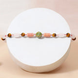 Rose Quartz Tiger Eye Beaded Rakhi & UXR Classic Oud Perfume Mug Set