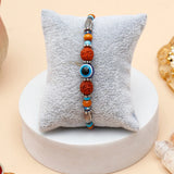 Rudraksha Evil Eye Beaded Rakhi & UXR Royal Life Perfume Mug Set