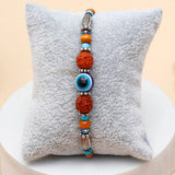 Rudraksha Evil Eye Beaded Rakhi & UXR Royal Life Perfume Mug Set