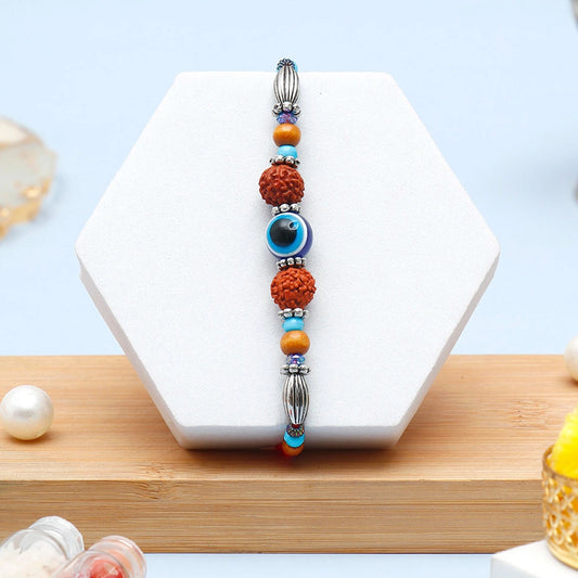 Rudraksha Evil Eye Beaded Rakhi & Archies 01 Perfume Mug Set