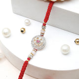 Crimson Medallion & Golden Heart Tassel Rakhi Set