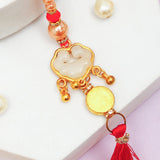 Crimson Medallion & Golden Heart Tassel Rakhi Set
