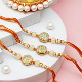Pack Of 3 Golden Hue Spinning Rakhi