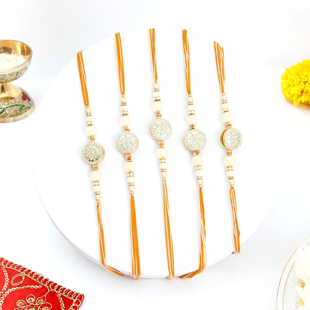 Pack Of 5 Golden Hue Spinning Rakhi