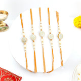 Pack Of 5 Golden Hue Spinning Rakhi