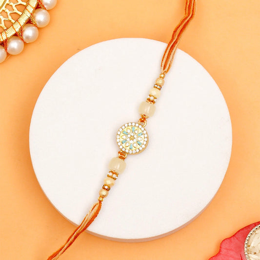 Golden Hue Spinning Rakhi