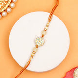 Golden Hue Spinning Rakhi
