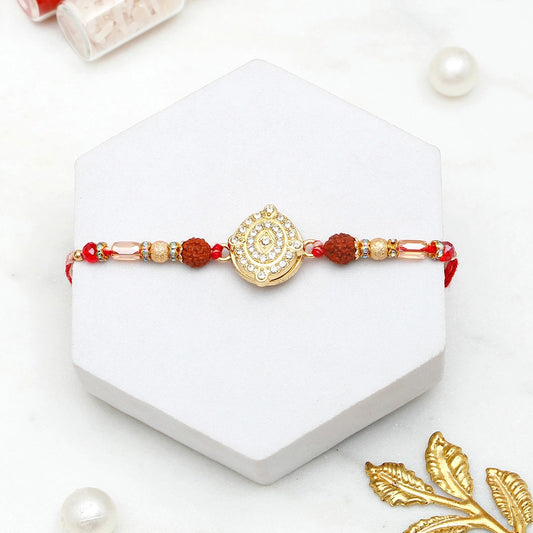 Rudraksha Mandala Charm Rakhi & Archies 01 Musk Perfume Mug Set
