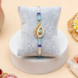 Evil Eye Rakhi for Brother with Perfume - Paisley Charm Rakhi & UXR Royal Life