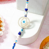 Layered Circle Evil Eye Rakhi & UXR Royal Life Perfume Mug Set