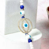 Layered Circle Evil Eye Rakhi & UXR Royal Life Perfume Mug Set