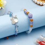 Crystal Swan Charm & Lavender Ceramic Bead Rakhi Set