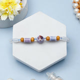 Crystal Swan Charm & Lavender Ceramic Bead Rakhi Set