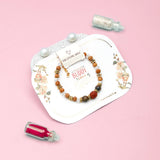 Rudraksha Tiger Eye & Golden Charm Tassel Rakhi Set
