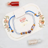 Ivory Quartet Charm Rakhi Set