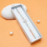 Silver Medallion & Pastel Floral Tassel Rakhi Set