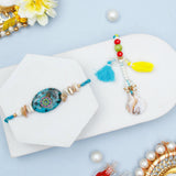Teal Stone Medallion & Shell Tassel Rakhi Set