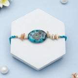 Teal Stone Medallion & Shell Tassel Rakhi Set