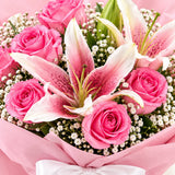 Pink Oriental Lily & Aqua-Pink Roses Bouquet in Pink Frosted Wrap