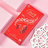Premium Set Of 3 Bhai Rakhi Hamper with Besan Laddoo, Cashew & Lindt Lindor Milk Chocolate